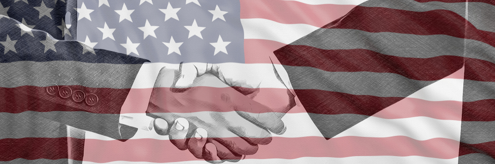 Black and white handshake on US flag background, agreement concept